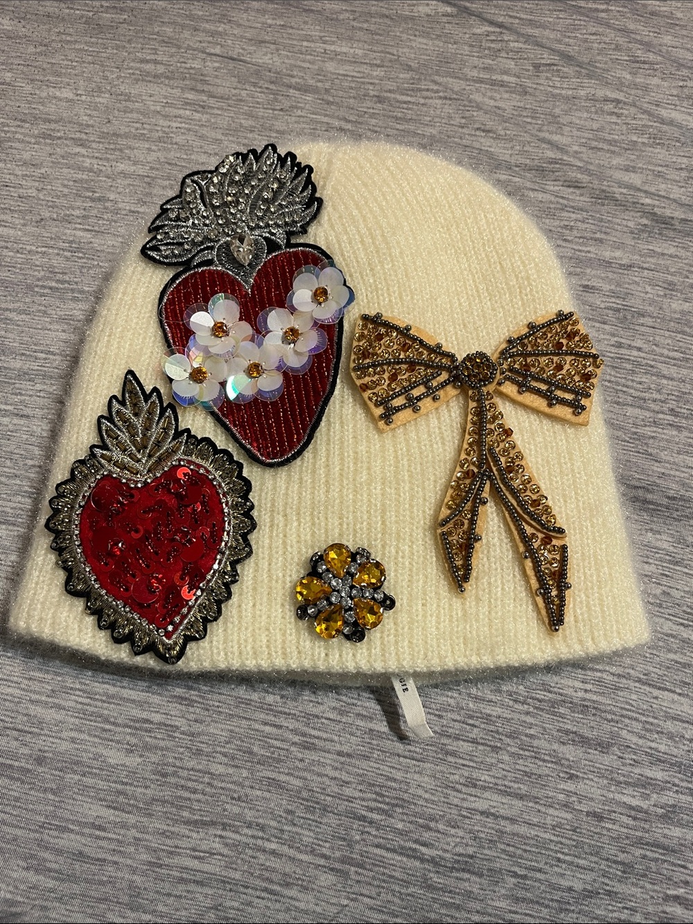 Anthropologie White Beanie with Red Heart Patches & Gold Bow Appliqué